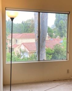Close-up of custom roller shades in Santa Clarita, showing smooth operation and modern design.
