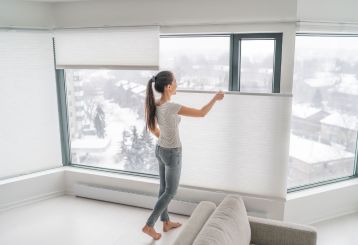 Beautiful Cordless blinds and shades installed on windows, adding natural texture to the interior.